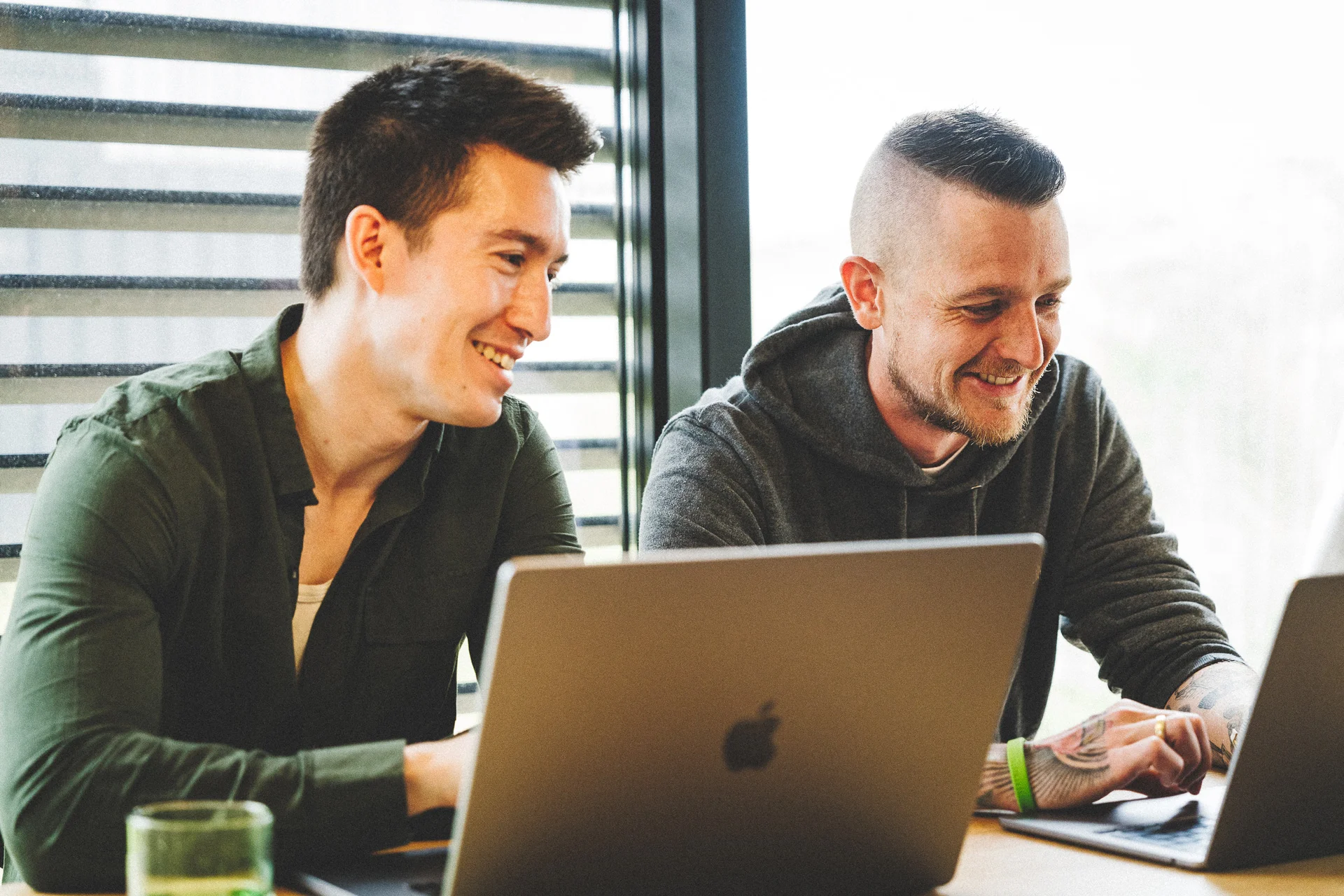 Two Octily developers pairing on code